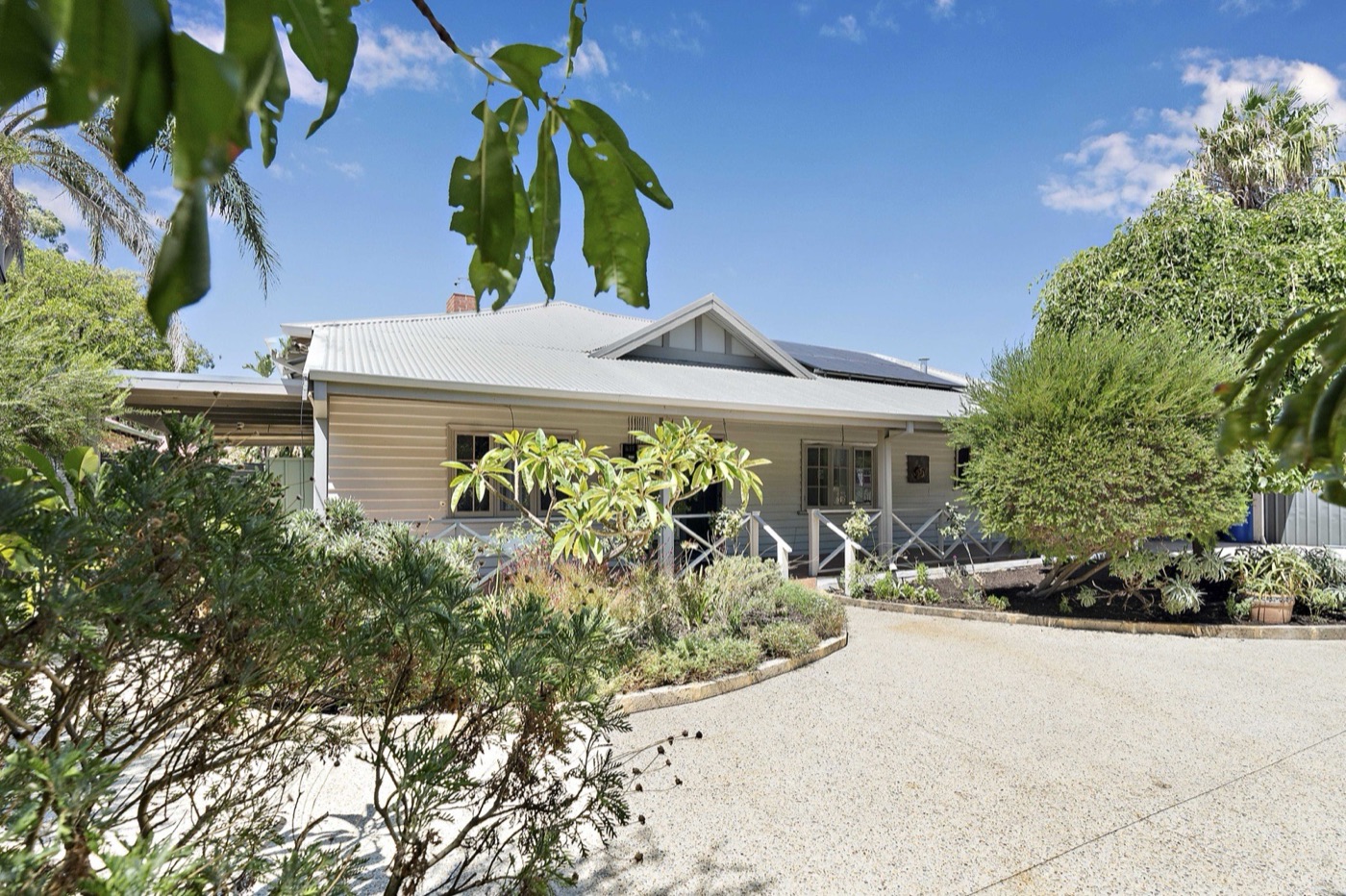 A character weatherboard home with established gardens