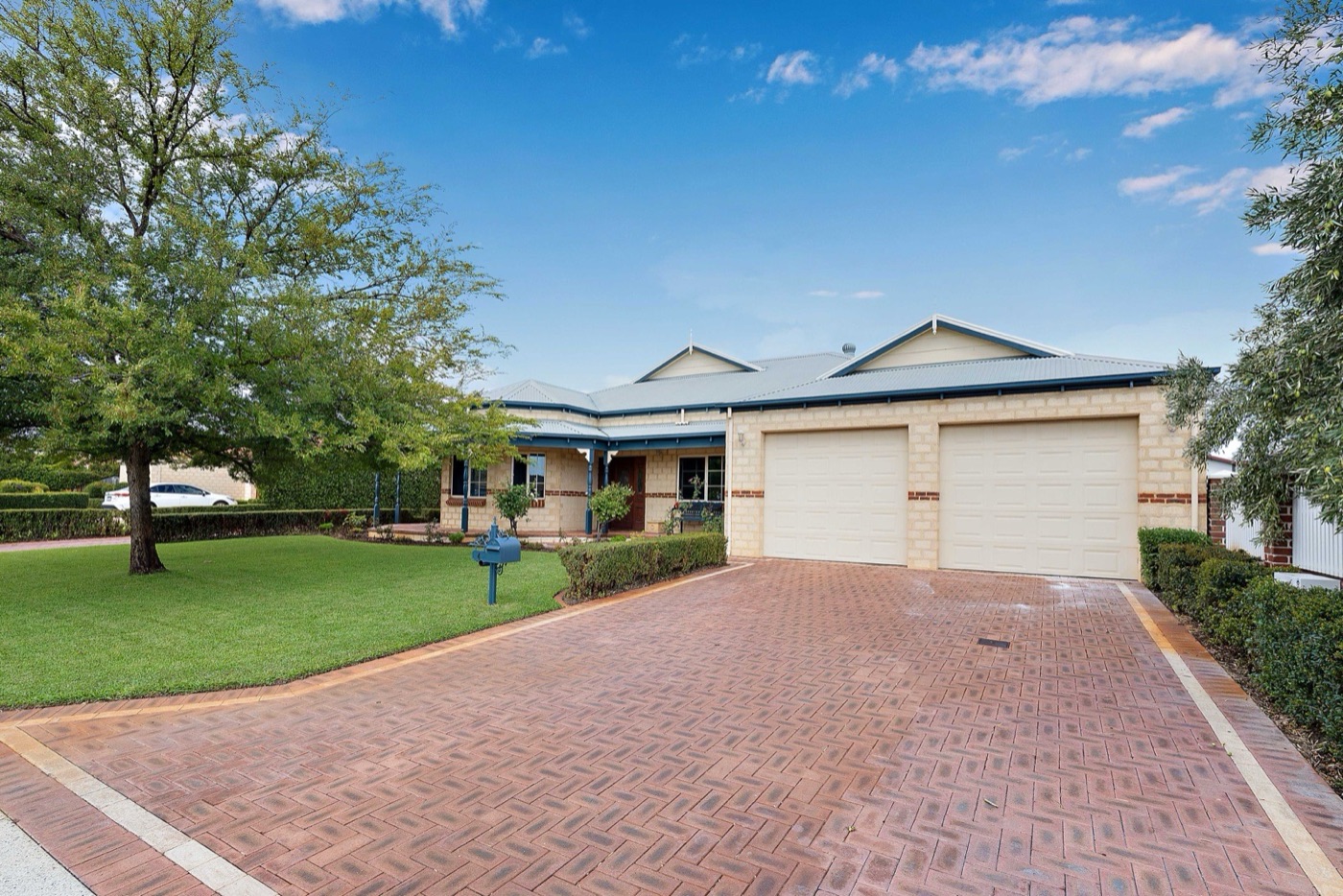 A modern brick family home with double garage